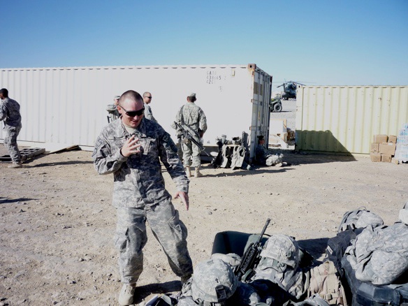 Sgt Neal practicing his Kempo moves on his unsuspecting armor and gear.