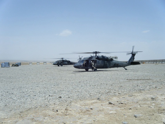 Blackhawks on the HLZ, waiting for passengers.