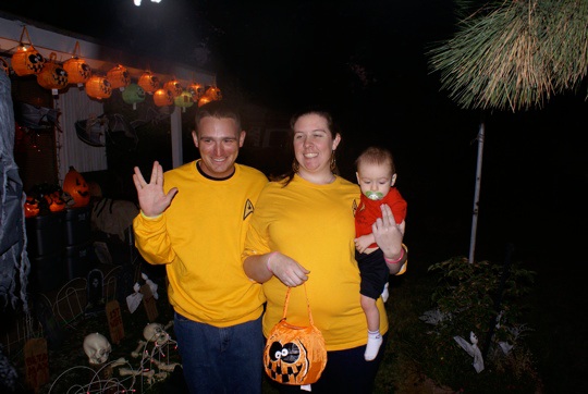 Pat and Kelly taking Jack out on his first Halloween. Yes, Jackʼs a red shirt. Hmmm.....